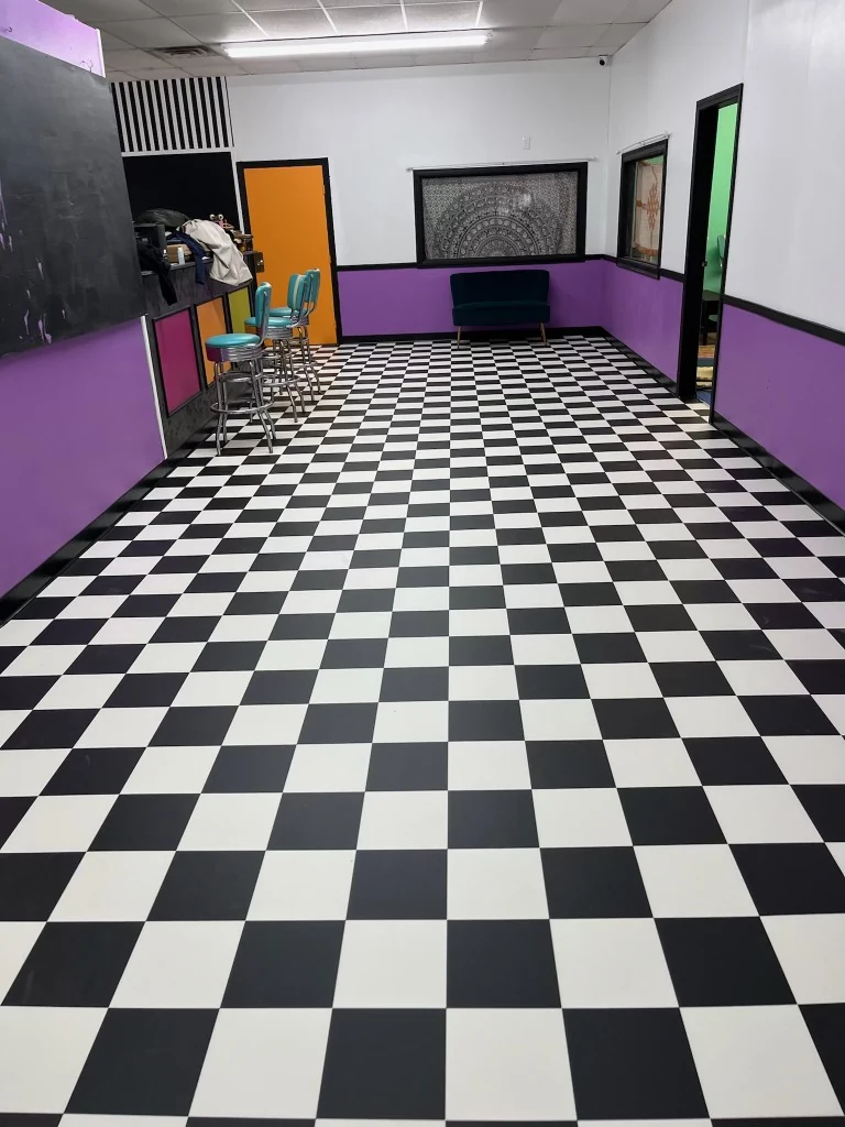 Black and white checkerboard tile floor installed in Connecticut