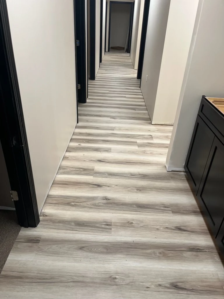 Wood-look LVP flooring installed in a Connecticut office hallway